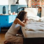 A woman praying in bed | The Power of Forgiveness According to the Bible